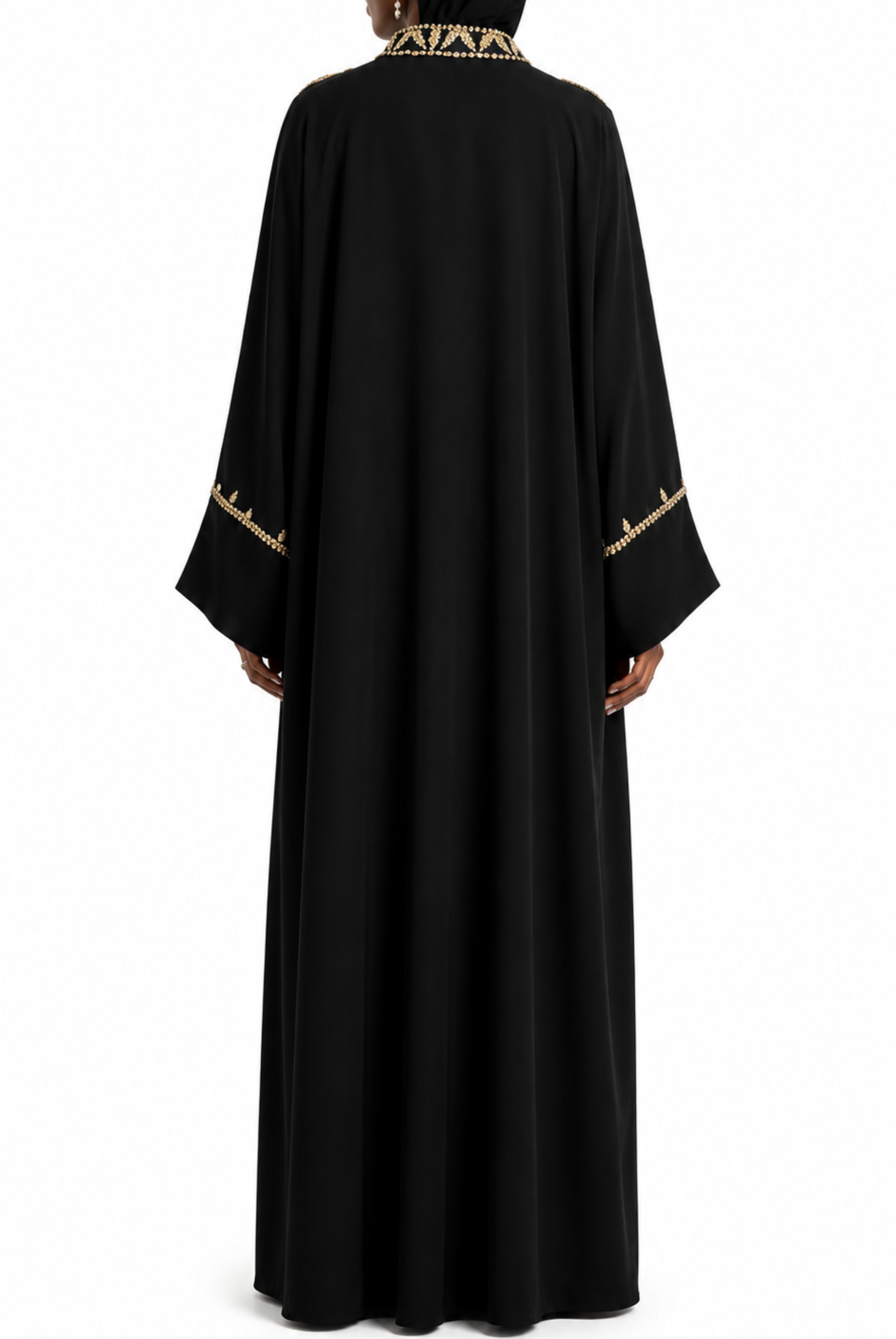 Black abaya with gold embroidery on a white background