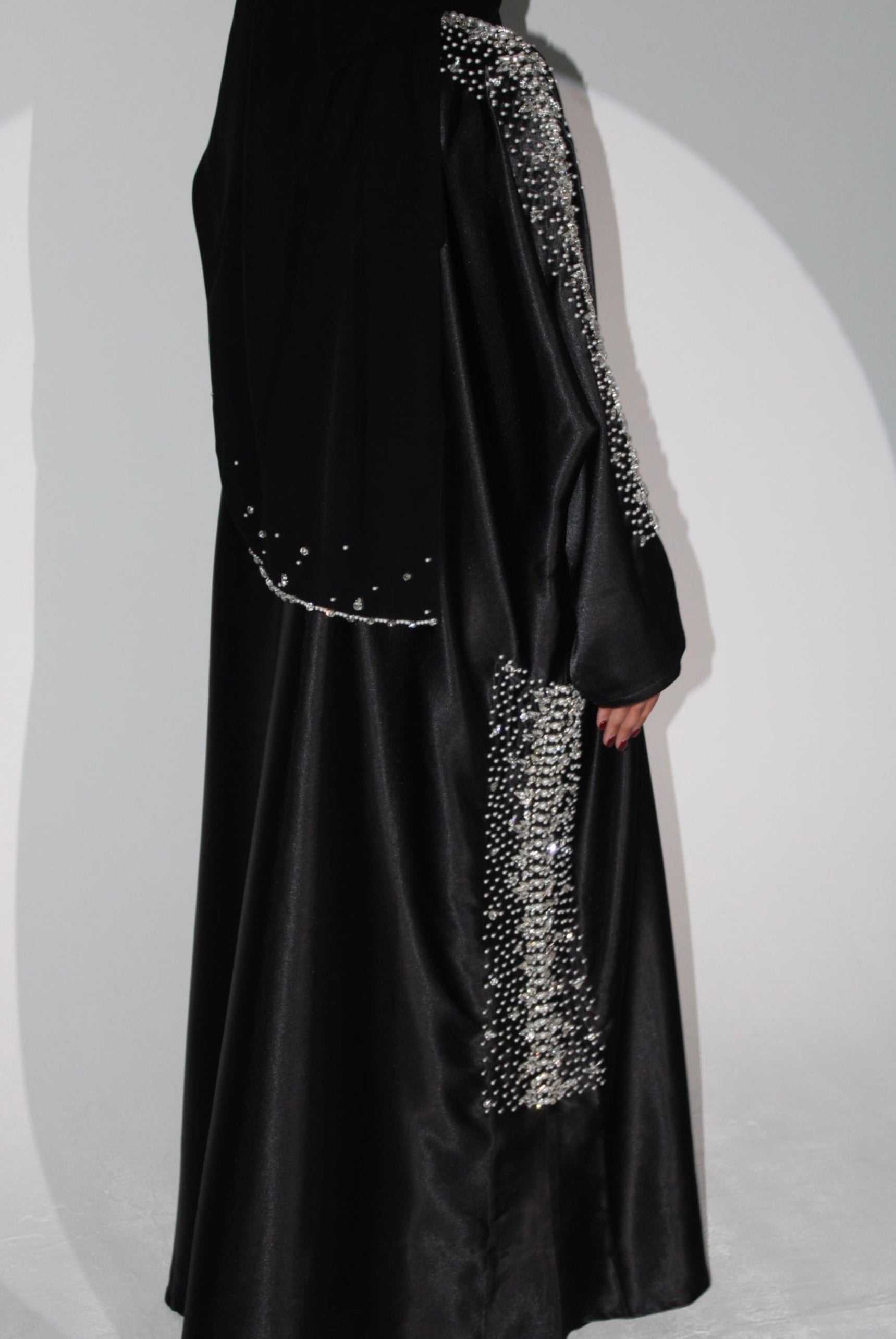 Black satin embellished evening abaya with silver crystal rhinestones.