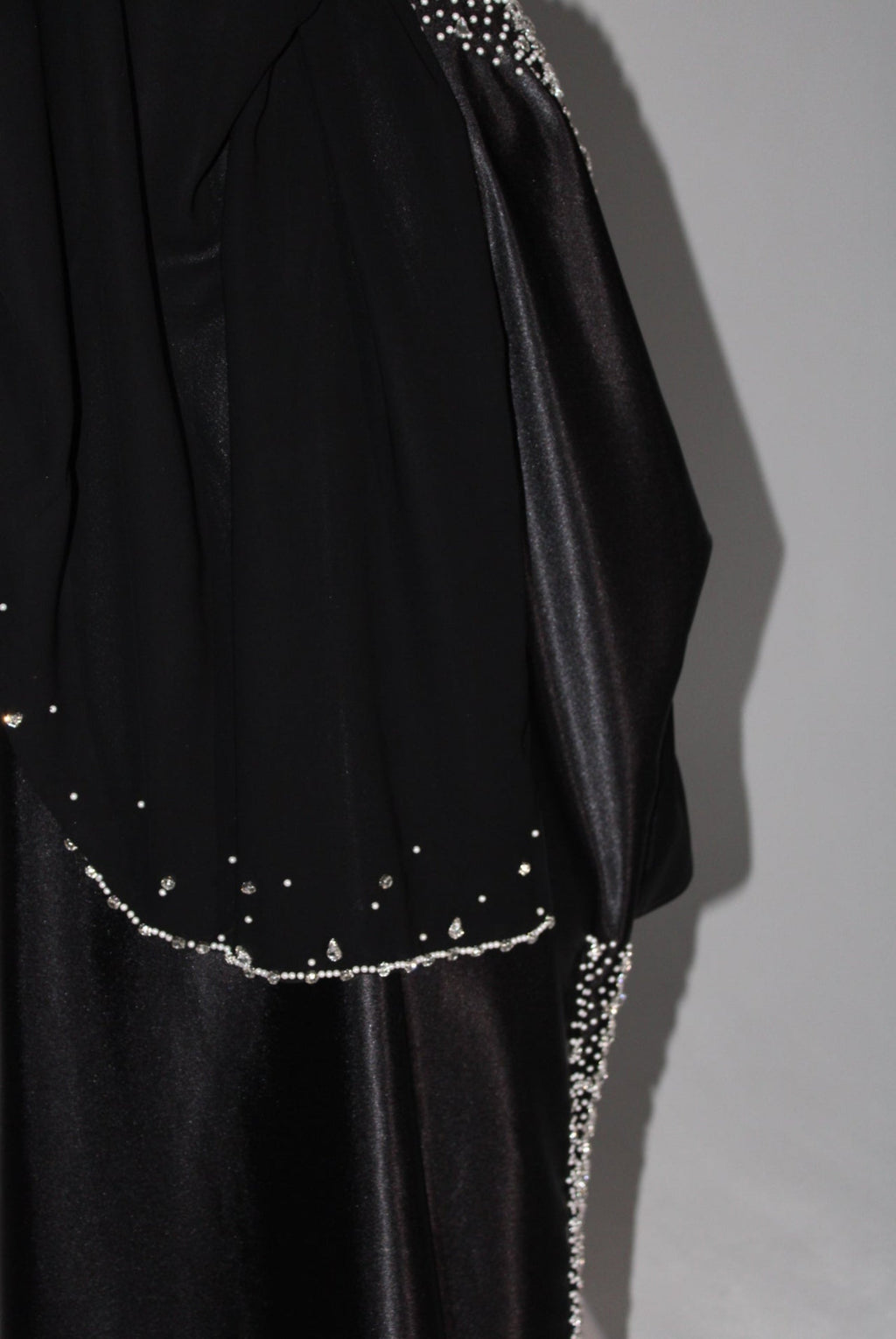 Black satin embellished evening abaya with silver crystal rhinestones.